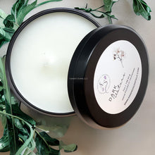 Load image into Gallery viewer, Dark Waters candle tin with sea salt and amber notes