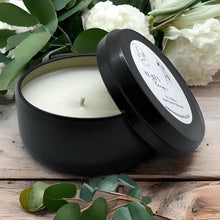 Load image into Gallery viewer, Ke-Ke’s Reign matte black soy wax candle tin with lavender and amber