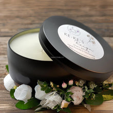 Load image into Gallery viewer, Soy blend travel tin candle with earthy floral fragrance