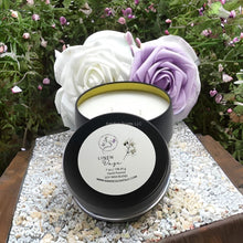 Load image into Gallery viewer, Linen Daze candle tin with fresh cotton and lavender scent