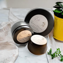 Load image into Gallery viewer, Luxury travel tin candles for woodsy, velvety home ambiance