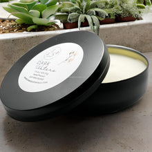 Load image into Gallery viewer, Dark Waters candle tin with sea salt and amber notes