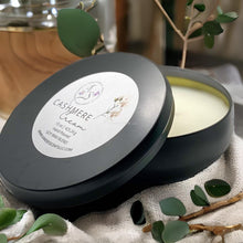 Load image into Gallery viewer, Luxury black tin candle with warm amber and musk notes