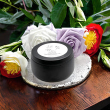 Load image into Gallery viewer, Matte black soy candle tin with peach and cotton notes