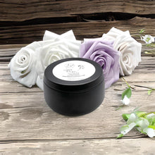 Load image into Gallery viewer, Matte black soy candle tin with peach and cotton notes
