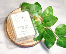 Load image into Gallery viewer, Flameless wax melts with fresh tea, citrus, and soft musk notes