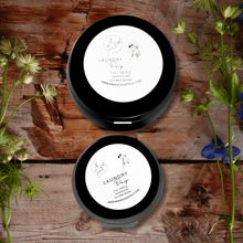 Load image into Gallery viewer, Matte black soy candle tins with clean laundry fragrance