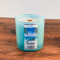 Coastal Breeze candle in blue glass jar with wooden wick