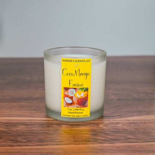 CocoMango Fusion candle in clear glass jar with wooden wick
