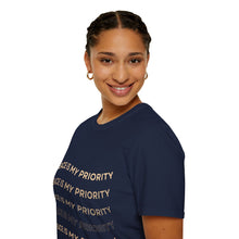 Load image into Gallery viewer, Person wearing a navy blue t-shirt with 'Peace is my priority' text on a white background
