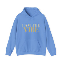 Load image into Gallery viewer, Blue hoodie with 'I AM THE VIBE' text on a white background
