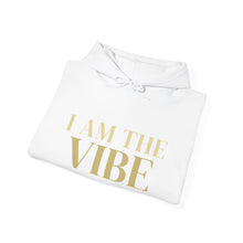 Load image into Gallery viewer, White hoodie with 'I AM THE VIBE' text in gold on a white background
