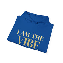 Load image into Gallery viewer, Blue hoodie with 'I AM THE VIBE' text on a white background
