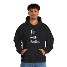 Load image into Gallery viewer, Person wearing a black hoodie with 'Lit with intention' text on a white background
