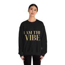 Load image into Gallery viewer, Person wearing a black sweatshirt with a graphic design 'I AM THE VIBE' text on a white background
