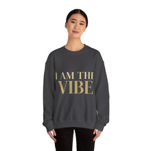 Load image into Gallery viewer, Person wearing a dark gray sweatshirt with 'I AM THE VIBE' design on a white background
