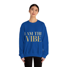 Load image into Gallery viewer, Person wearing a blue sweatshirt with 'I AM THE VIBE' text on a white background
