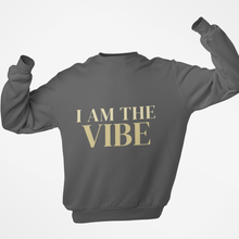 Load image into Gallery viewer, Gray sweatshirt with 'I AM THE VIBE' text on a white background
