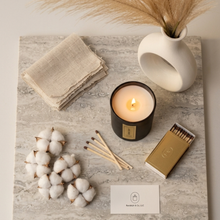 Load image into Gallery viewer, Candle with cotton, matches, and a vase on a textured surface
