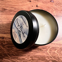 Soy candle tin with pineapple, coconut, and vanilla notes